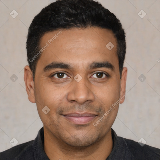 Joyful latino young-adult male with short  black hair and brown eyes