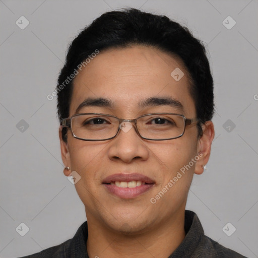 Joyful white adult male with short  black hair and brown eyes