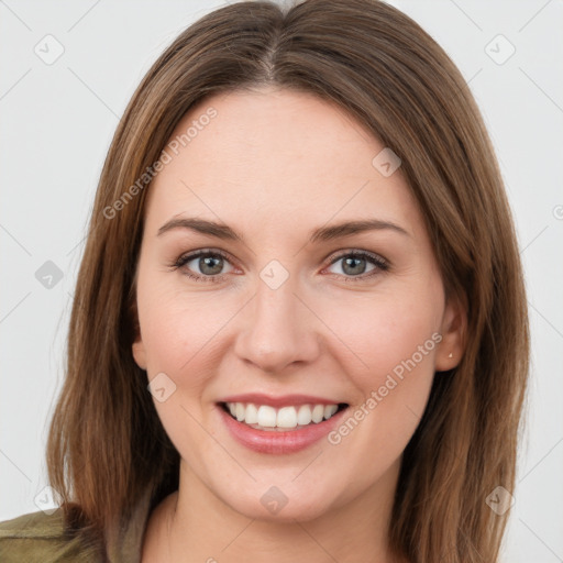 Joyful white young-adult female with long  brown hair and green eyes