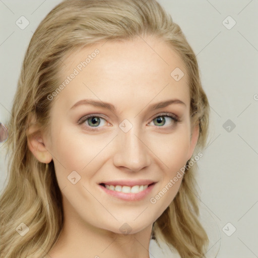 Joyful white young-adult female with long  brown hair and blue eyes