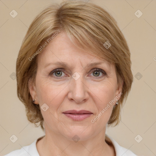 Joyful white adult female with medium  brown hair and grey eyes