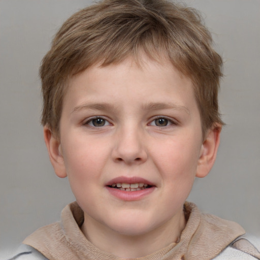 Joyful white child male with short  brown hair and grey eyes