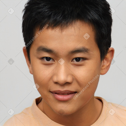 Joyful asian young-adult male with short  black hair and brown eyes