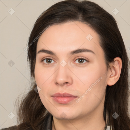 Neutral white young-adult female with long  brown hair and brown eyes