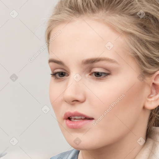 Neutral white young-adult female with long  brown hair and blue eyes