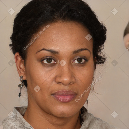 Joyful black adult female with short  brown hair and brown eyes