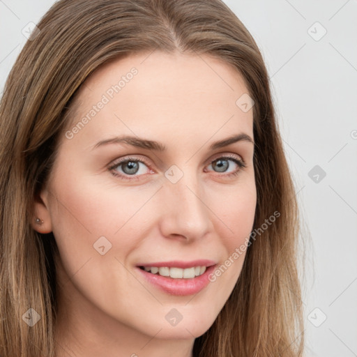 Joyful white young-adult female with long  brown hair and grey eyes