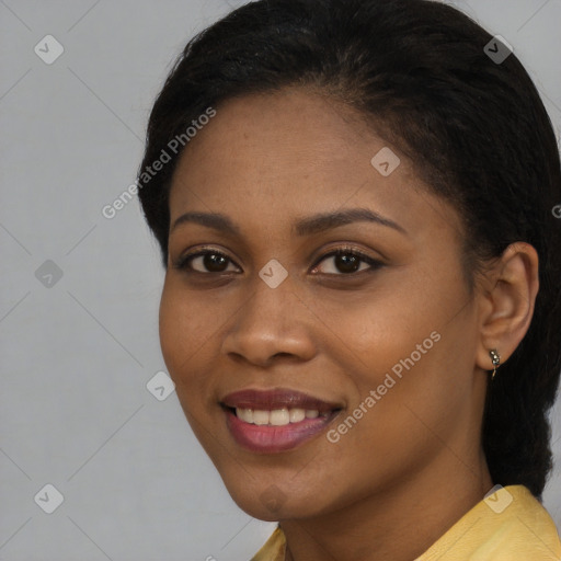 Joyful black young-adult female with medium  black hair and brown eyes