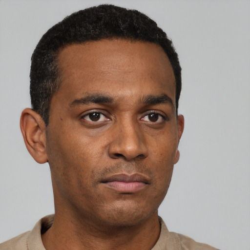 Neutral black young-adult male with short  black hair and brown eyes