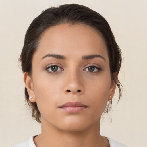 Neutral asian young-adult female with medium  brown hair and brown eyes