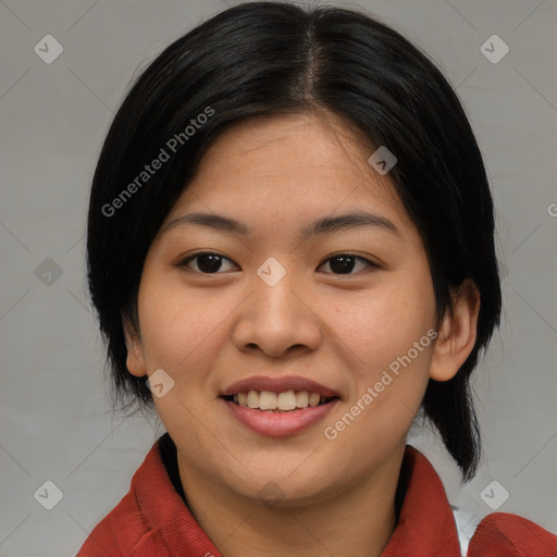 Joyful asian young-adult female with medium  black hair and brown eyes