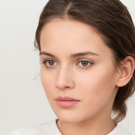 Neutral white young-adult female with medium  brown hair and brown eyes