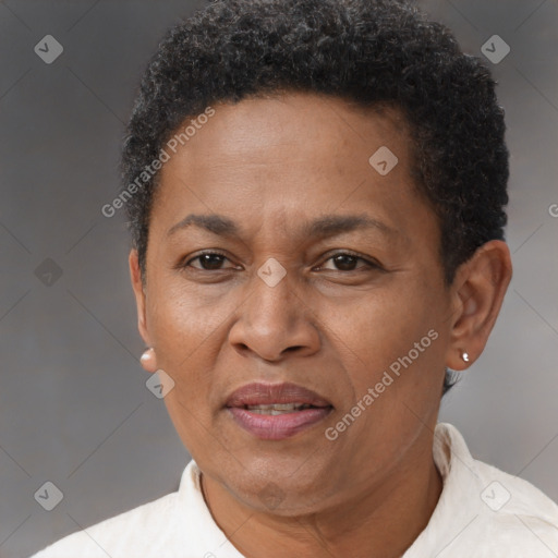 Joyful black adult female with short  brown hair and brown eyes