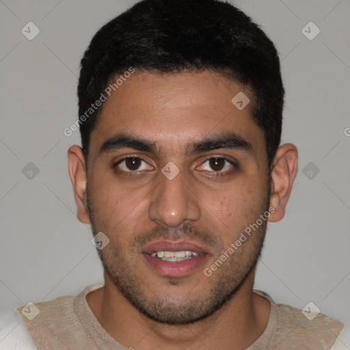 Joyful white young-adult male with short  black hair and brown eyes