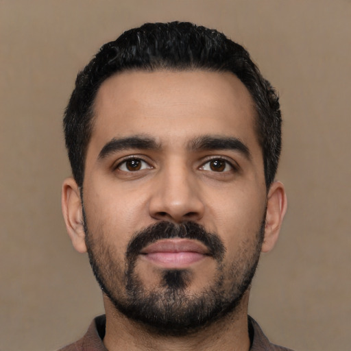 Neutral latino young-adult male with short  black hair and brown eyes
