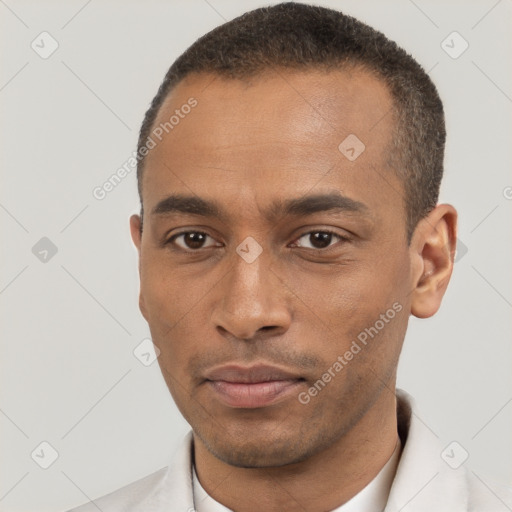 Neutral black young-adult male with short  brown hair and brown eyes