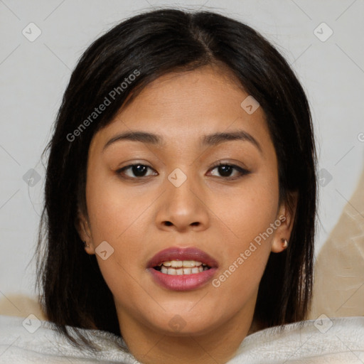 Joyful asian young-adult female with medium  brown hair and brown eyes