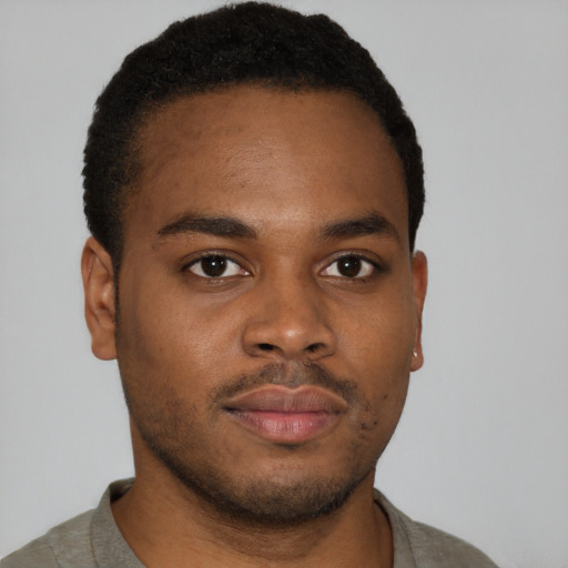 Neutral black young-adult male with short  brown hair and brown eyes