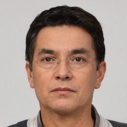 Neutral white adult male with short  black hair and brown eyes