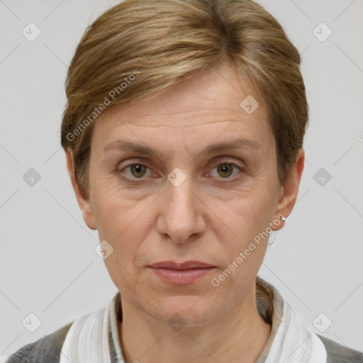 Joyful white adult female with short  brown hair and grey eyes