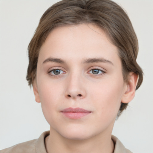 Neutral white young-adult female with short  brown hair and grey eyes