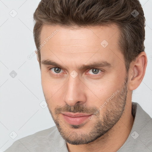 Neutral white adult male with short  brown hair and brown eyes