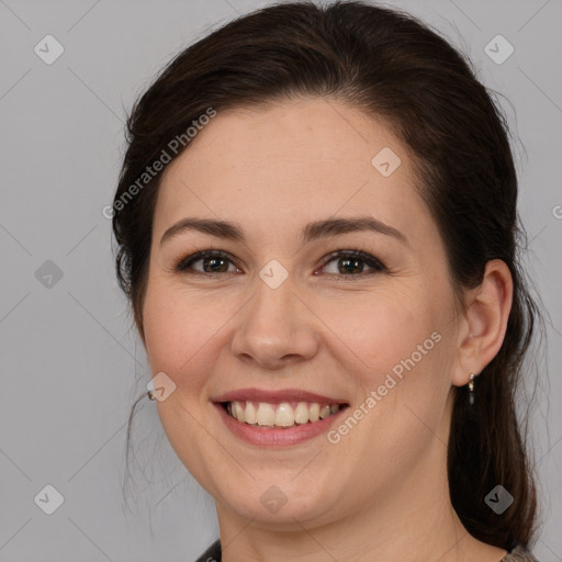 Joyful white young-adult female with medium  brown hair and brown eyes