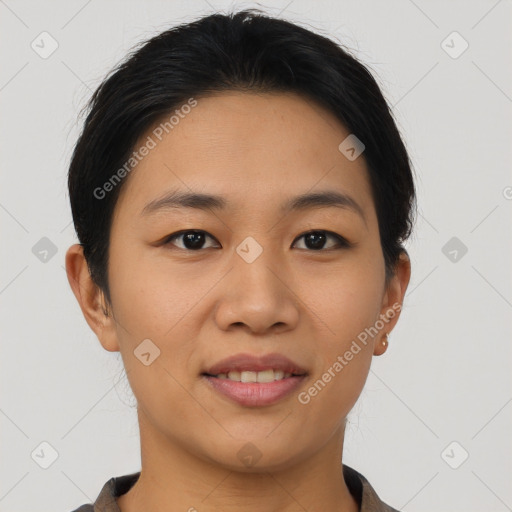 Joyful asian young-adult female with short  brown hair and brown eyes