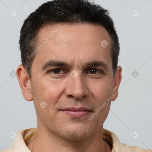 Joyful white adult male with short  brown hair and brown eyes