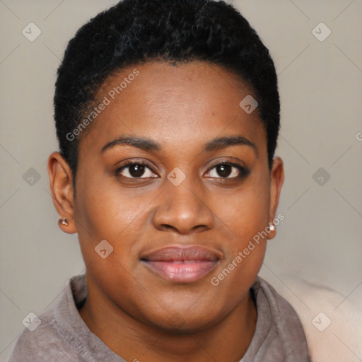 Joyful black young-adult female with short  black hair and brown eyes