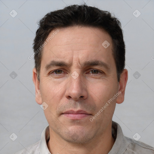 Neutral white adult male with short  brown hair and brown eyes