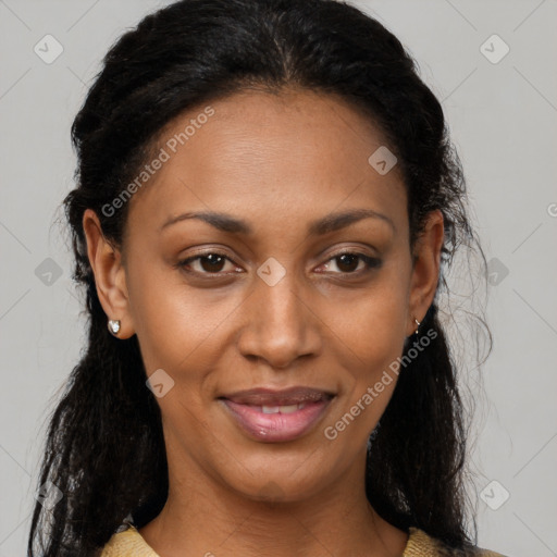 Joyful latino adult female with medium  brown hair and brown eyes