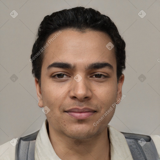 Joyful white young-adult male with short  black hair and brown eyes