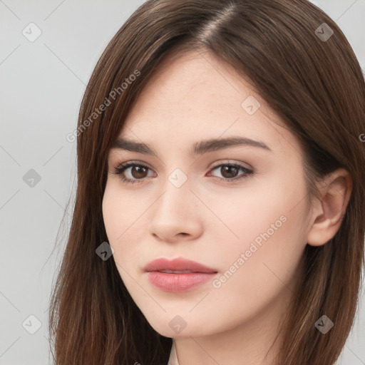 Neutral white young-adult female with long  brown hair and brown eyes