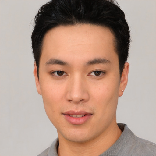Neutral asian young-adult male with short  black hair and brown eyes