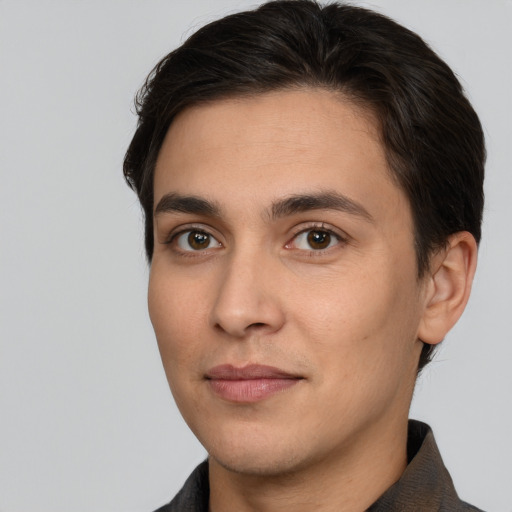 Joyful white young-adult male with short  brown hair and brown eyes