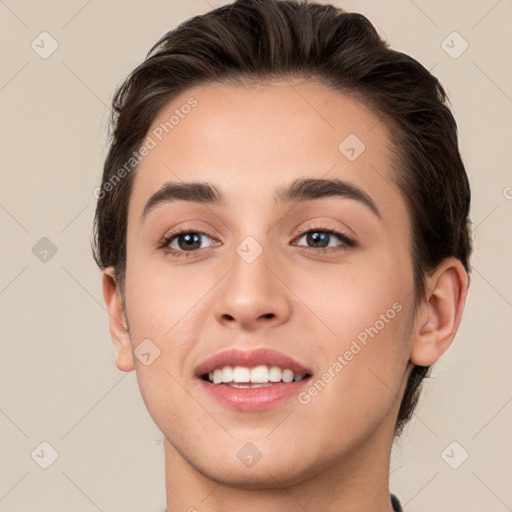 Joyful white young-adult female with short  brown hair and brown eyes