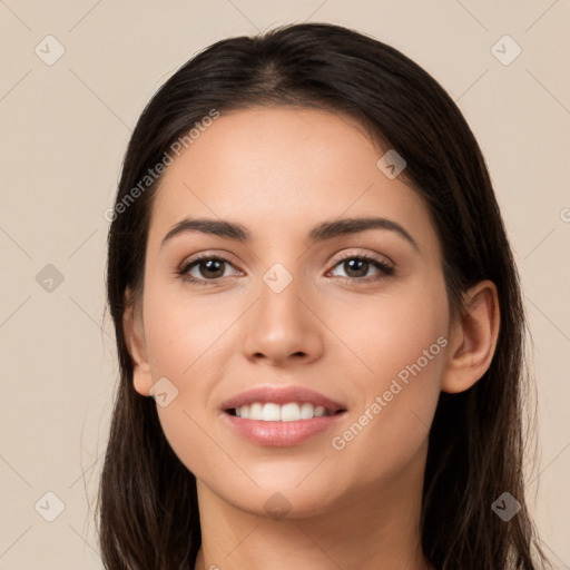 Joyful white young-adult female with long  brown hair and brown eyes