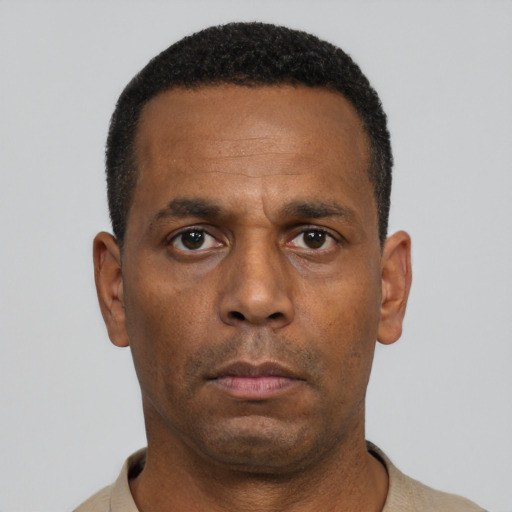 Neutral black adult male with short  black hair and brown eyes