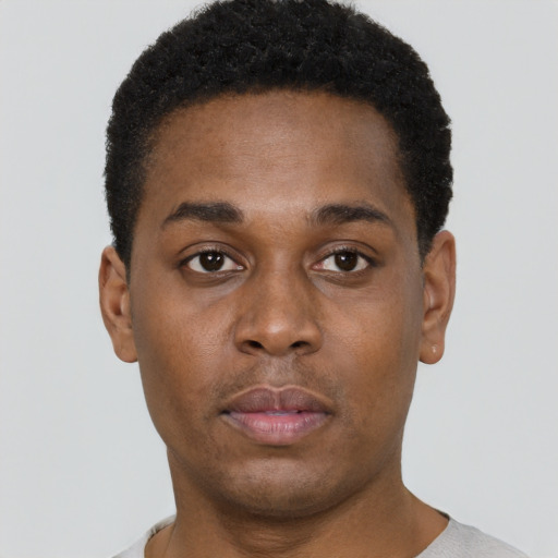 Neutral black young-adult male with short  brown hair and brown eyes