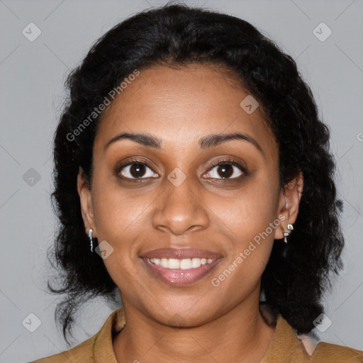 Joyful black young-adult female with medium  black hair and brown eyes