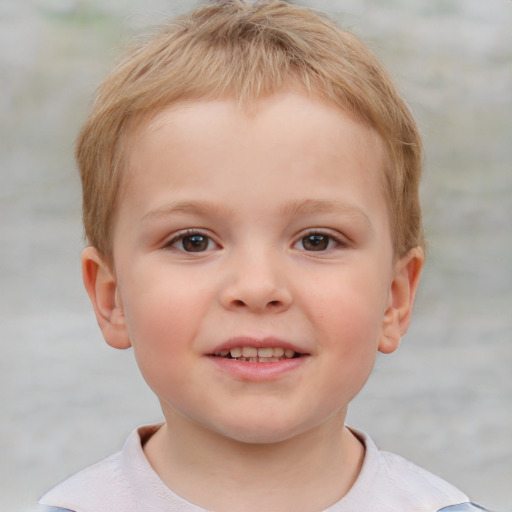 Joyful white child male with short  brown hair and brown eyes