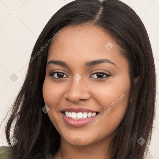 Joyful latino young-adult female with long  brown hair and brown eyes