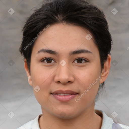 Joyful asian young-adult female with short  brown hair and brown eyes