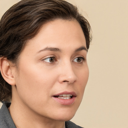 Neutral white young-adult female with medium  brown hair and brown eyes