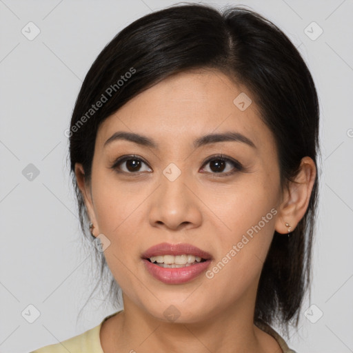 Joyful asian young-adult female with medium  brown hair and brown eyes