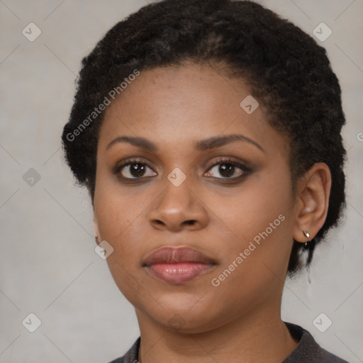 Neutral black young-adult female with short  brown hair and brown eyes