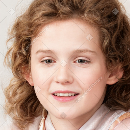 Joyful white child female with medium  brown hair and blue eyes