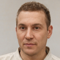 Neutral white adult male with short  brown hair and brown eyes