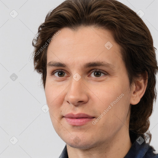 Joyful white young-adult male with medium  brown hair and brown eyes